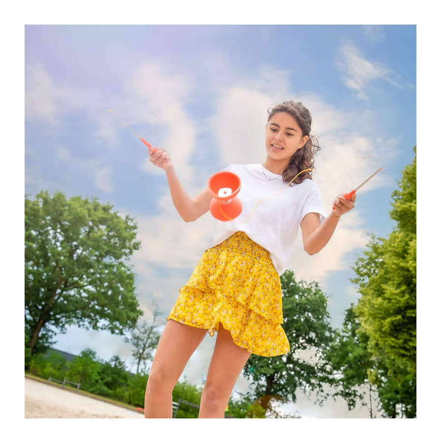 Engelhart diabolo van rubber met metalen stokjes - fluor rood