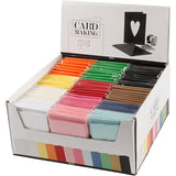 Https: www.cchobby.nl kaarten-en-enveloppen-afmeting-kaart-10-5x15-cm-afmeting-envelop-11-5x16-5-cm-diverse-kleuren-12x10-doos-1-doos - afbeelding 1