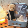 Egmont morris met kleding in koffer. 29x