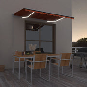 Vidaxl luifel handmatig uittrekbaar met led 300x250 cm oranje en bruin - afbeelding 1