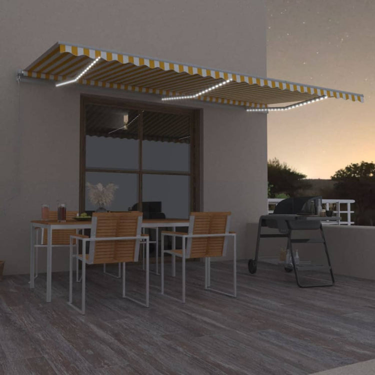 VidaXL Luifel handmatig uittrekbaar met LED 600x350 cm geel en wit