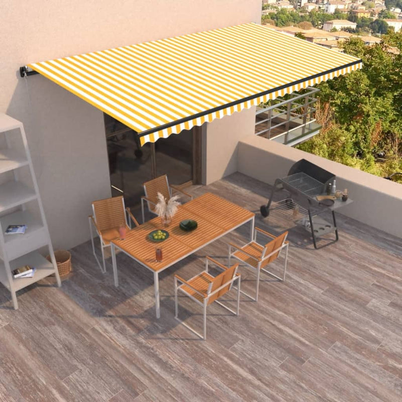VidaXL Luifel handmatig uittrekbaar 600x350 cm geel en wit