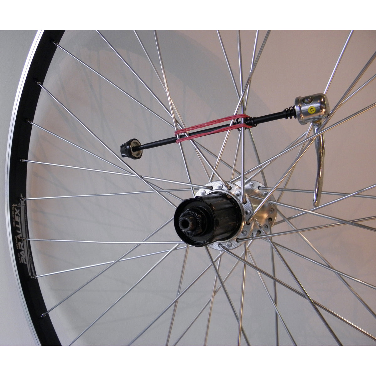 Achterwiel 28-15 8-13 8 622 uitval alu velg paralex zw.