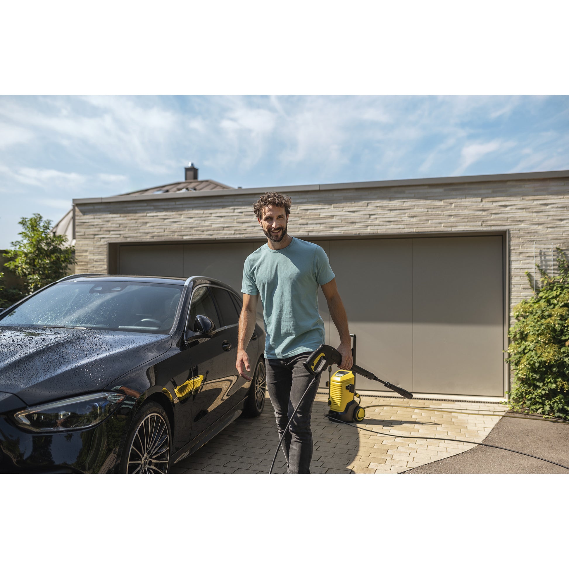 Kärcher k 5 wcm premium home hogedrukreiniger (geel zwart, met vuilfrees, slanghaspel en oppervlaktereiniger)