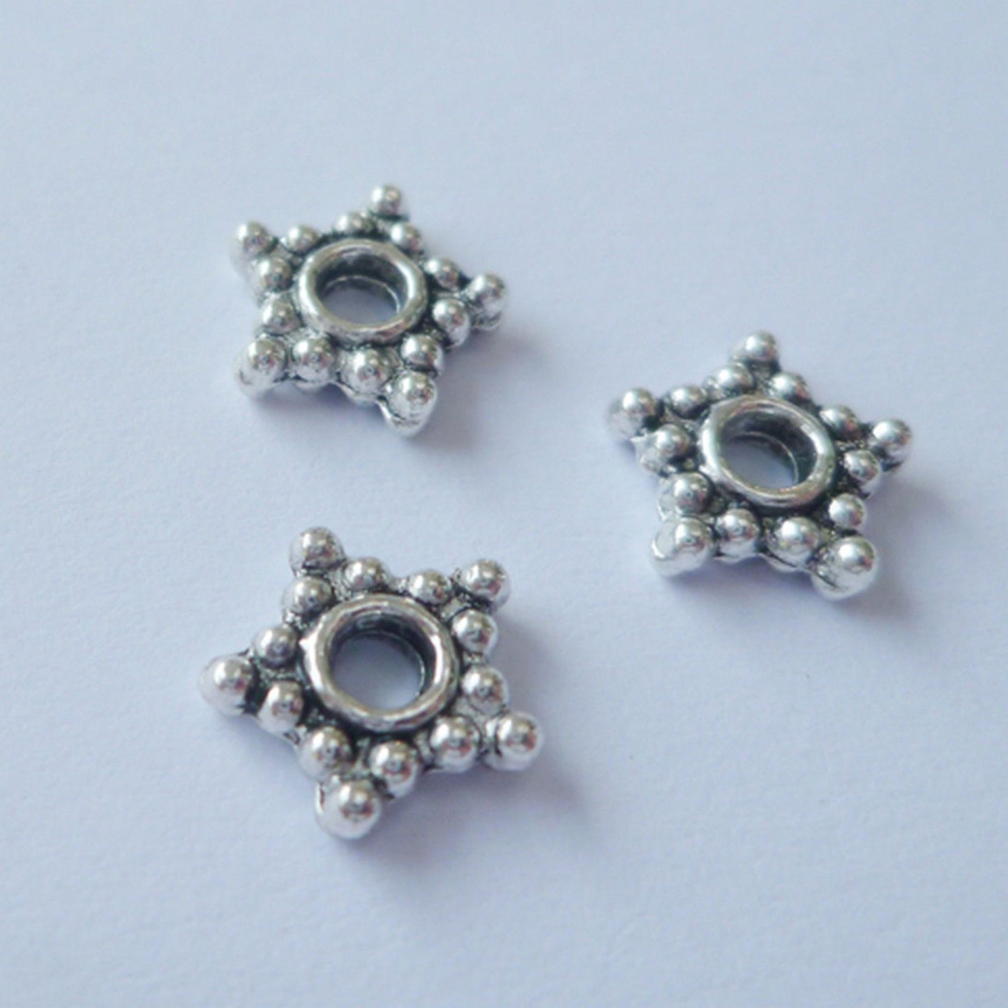 Nellie's choice • floral spacers 20stuks silver nr. 3