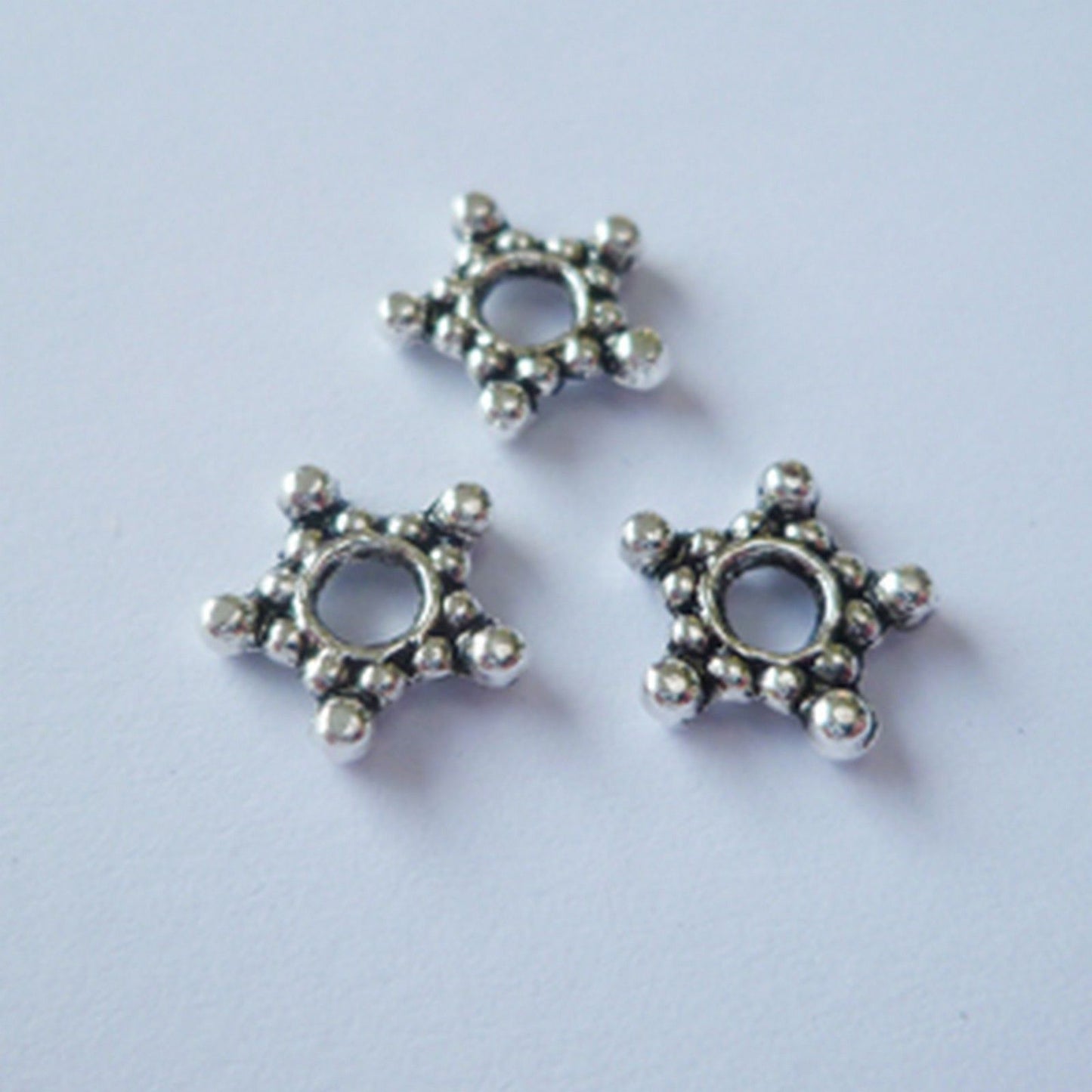 Nellie's choice • floral spacers 20stuks silver nr. 4