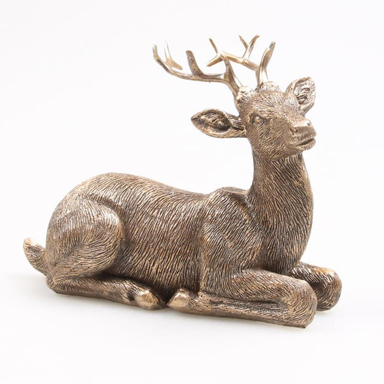 Season inspired decoration beeld hert liggend goud 15x10x15cm